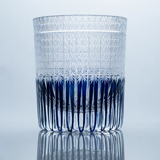 Shion Purple Edo Kiriko whiskey glass with hand-cut crystal star patterns and deep indigo-purple vertical cuts.