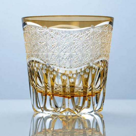 Golden Cascade Edo Kiriko whiskey glass with intricate starburst patterns and champagne-gold crystal detailing.
