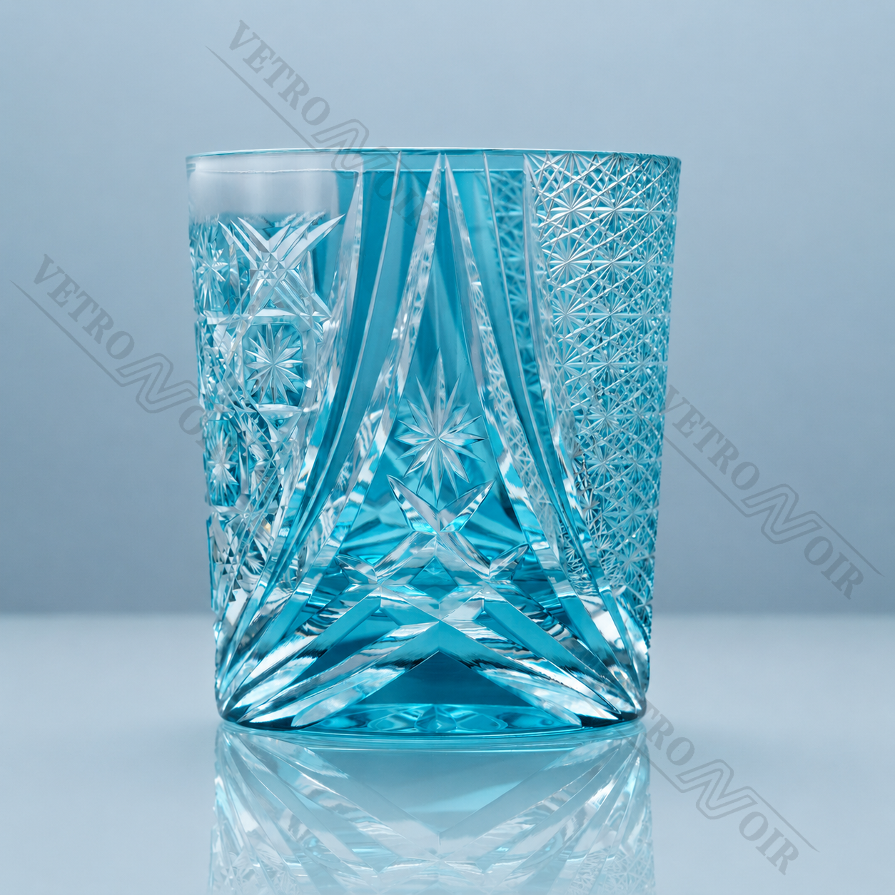 Aqua Star Prism Edo Kiriko whiskey glass with turquoise crystal body, hand-cut star details, and prism-style pattern.