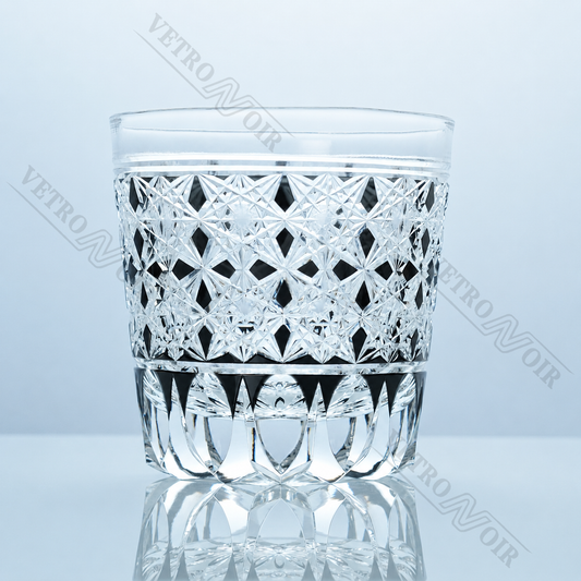 Noir Diamond Starburst crystal whiskey glass with clear hand-cut crystal, black diamond accents, and geometric star pattern.