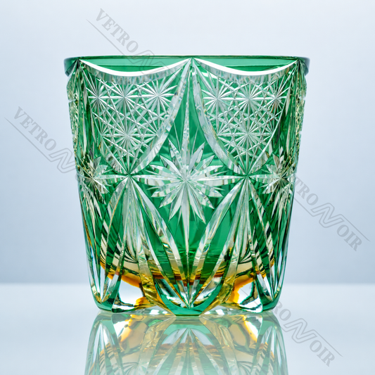 Emerald Gilded Starburst crystal whiskey glass with green crystal body, golden accents, and hand-cut starburst pattern.