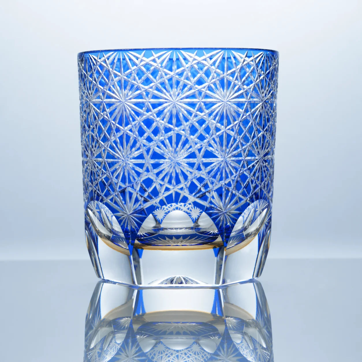 Blue Daisy hand-cut Edo Kiriko whiskey glass with crystal daisy patterns and a clear faceted base.